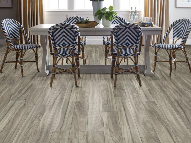 Dining room with wood-look laminate flooring from Capitol Carpet in Dalton, GA