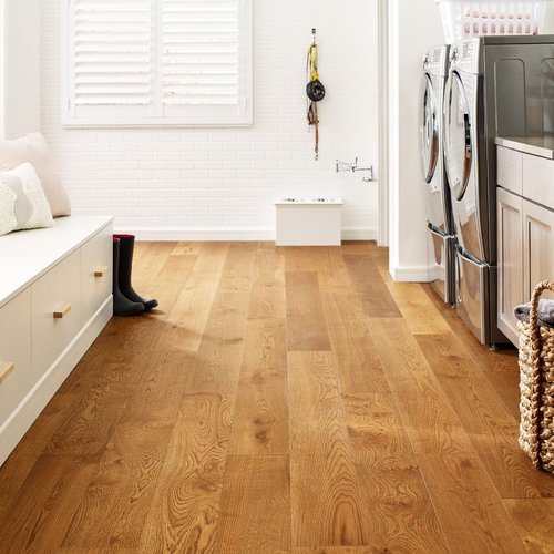 Laundry room with wood-look luxury vinyl flooring from Capitol Carpet in Dalton, GA