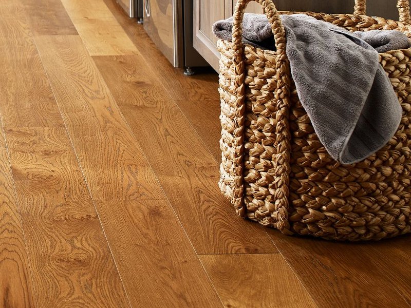 Laundry room with wood-look luxury vinyl flooring from Capitol Carpet in Dalton, GA